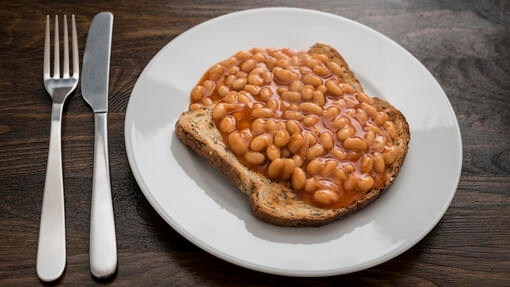 are baked beans harmful to dogs